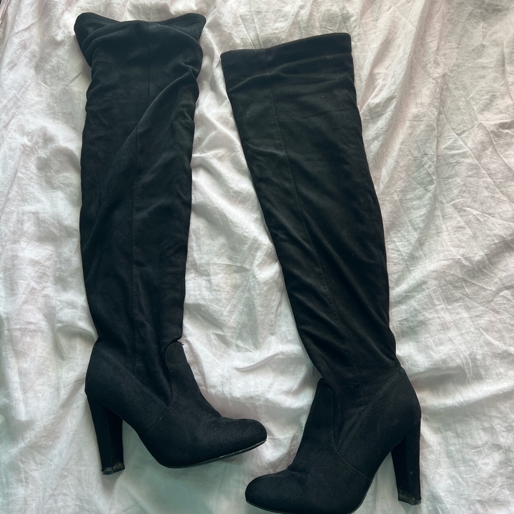 Above the knee black boots
